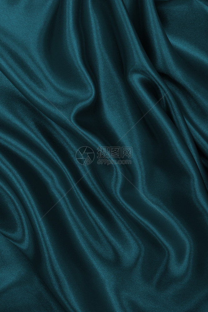 投标抽象的平滑优雅蓝色丝绸或席边奢华布质料可用作抽象背景本色设计窗帘图片
