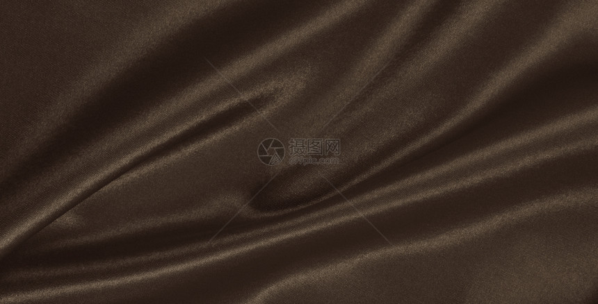 SepiatonedRetro风格的平滑优雅棕色丝绸或派文纹理可用作抽象背景优雅的时尚感图片