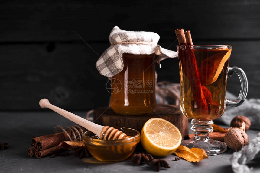 排毒美食茶蜂蜜黑色背景高分辨率照片茶蜂蜜黑色背景高质量照片伴侣图片