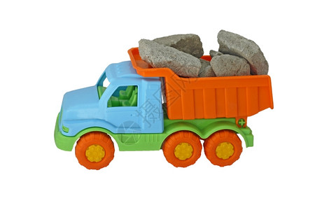 游戏车轮矿物运输石块的玩具彩色卡车白背景被隔绝图片