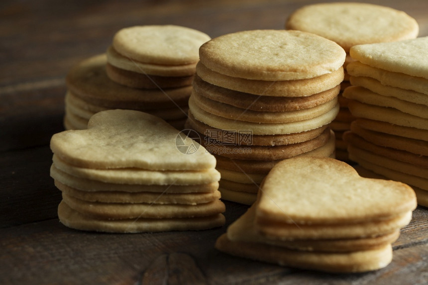 糖果饼干丹麦风格的奶油饼干和蜂蜜调味品一连串甜食美味和有用的饼干摄影作品一种图片