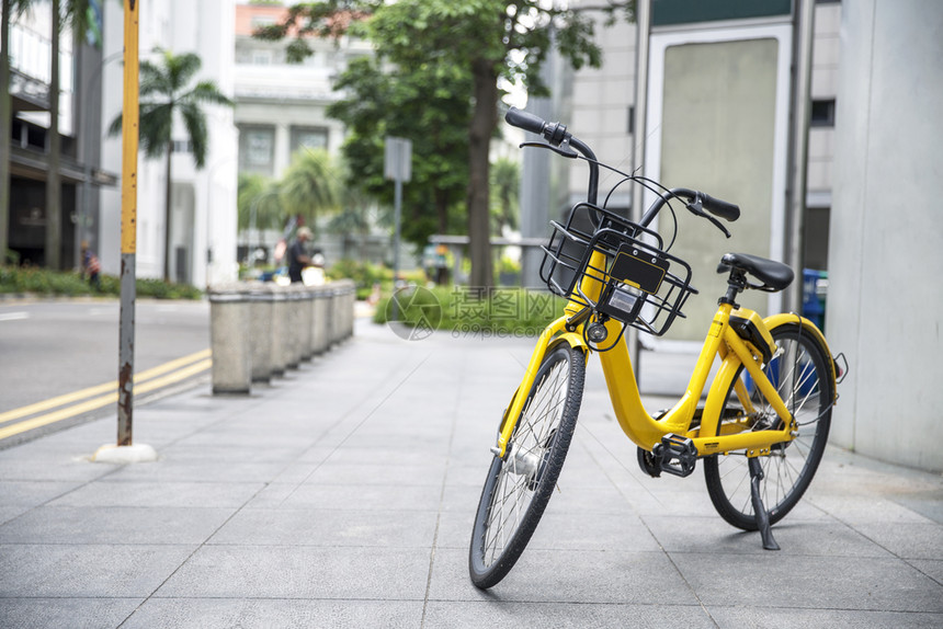 车辆未来公共园建筑中的黄色自行车背景和中市商业建筑景观图CentralCentralCity建造图片