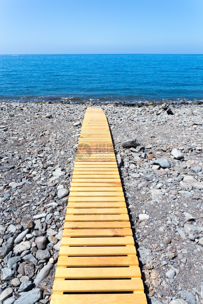 马德拉岛石头在灰滩上漫步的木卫脚道通往葡萄牙海洋欧洲的图片