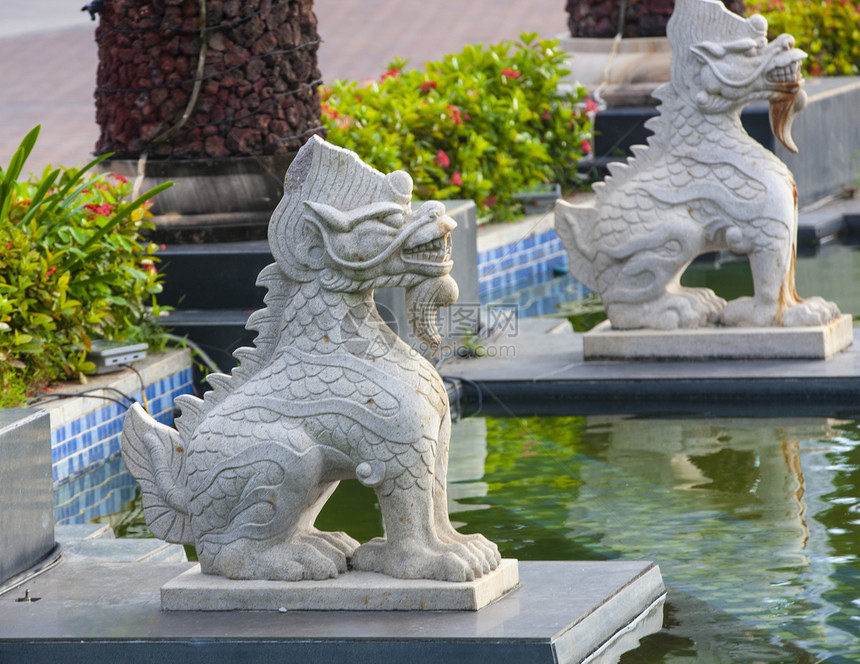 亚洲古老的胡须海南岛三亚的狮子雕塑图片