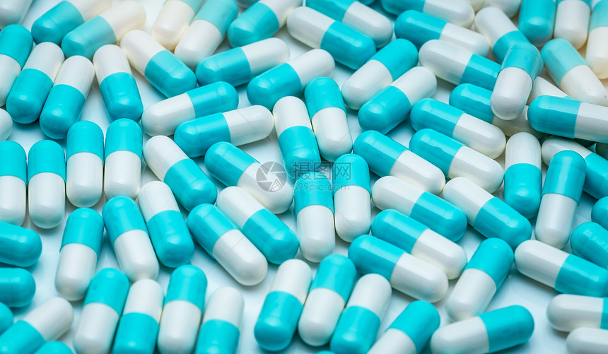 医院过度使用质地抗生素胶囊丸全框蓝白色抗生素胶囊丸纹理背景制药行业医疗保健和学背景抗生素耐药和超级细菌图片