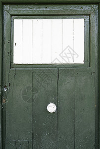 绿色木制门白旧乡村门的详情古董木头细节街道图片