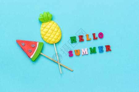 你好夏天和西瓜菠萝糖果背景图片