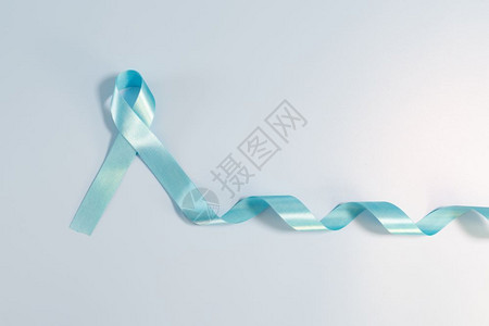 提高全民意识提高前列腺癌认识运动概念Menrrrsqopos健康概念蓝底背景支持患癌症男子标志的浅蓝色长尾丝带瘤抓住活动背景