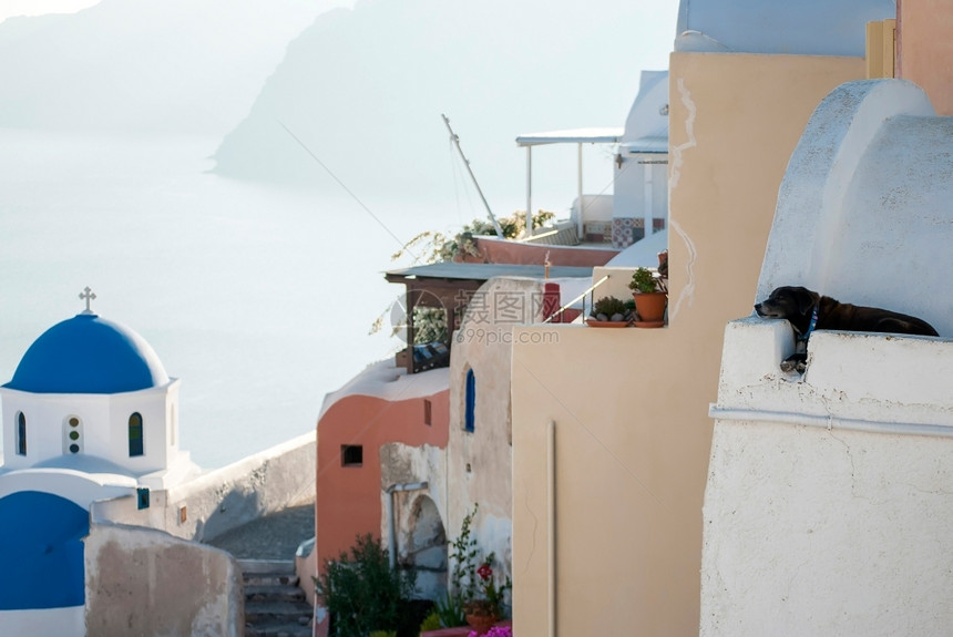 OiaSantorini希腊以浪漫和美丽的日落闻名岛传统的夏天图片