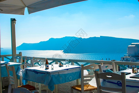 OiaSantorini希腊以浪漫和美丽的日落闻名风车夏天屋图片