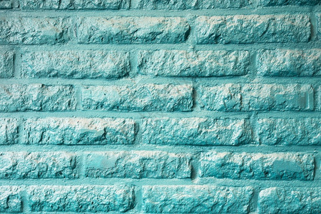 优质的绿石或奥水薄荷砖墙背景质素现代回流糊面彩色抽象风格石墙细节图片