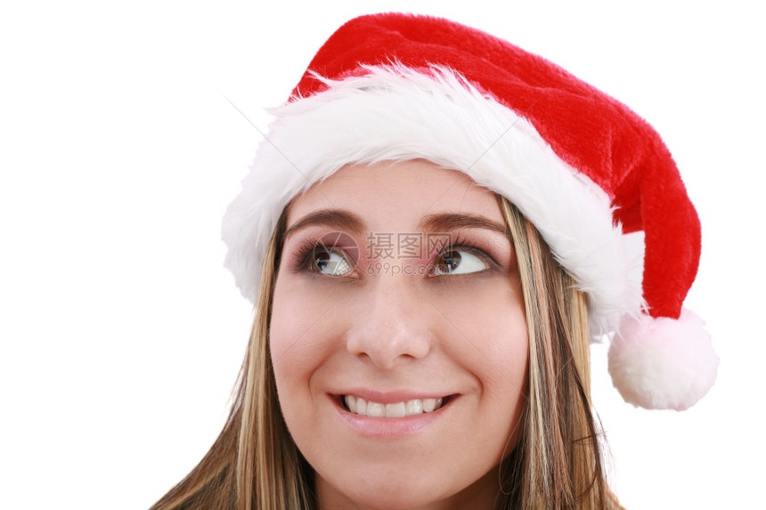 模型一个感女孩在圣塔帽想知道她会得到什么圣诞节女士感的图片