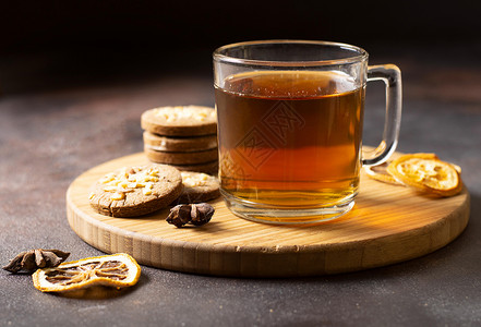 酸果蔓冬茶饮料配有饼干溶液和优质的美丽光照茶冬酒配有饼干高质量和清晰的美照片概念解析度假期浆果背景