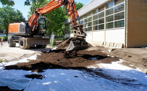土工布的覆盖物asrsquo防止有毒土壤污染挖掘机清洁土壤的应用盖子有毒愈合背景