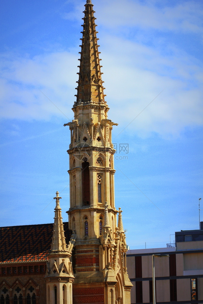 弗朗西斯班牙巴塞罗那市中心圣Francescde销售新福音教堂区的长细钟塔位于西班牙巴塞罗那市中心天空典型的图片