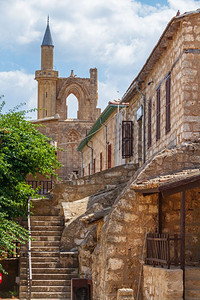 朗古斯塔凯梅尔穆斯塔法建造塞浦路斯岛法马古塔中世纪城的老旧建筑以肖像形式壁画背景