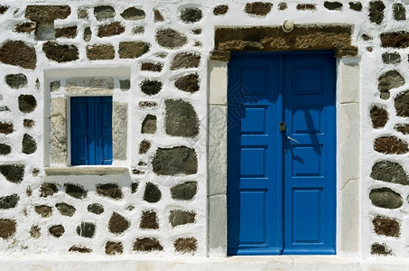 屋希腊圣托里尼岛红滩一个教堂门的经典瓷砖图片