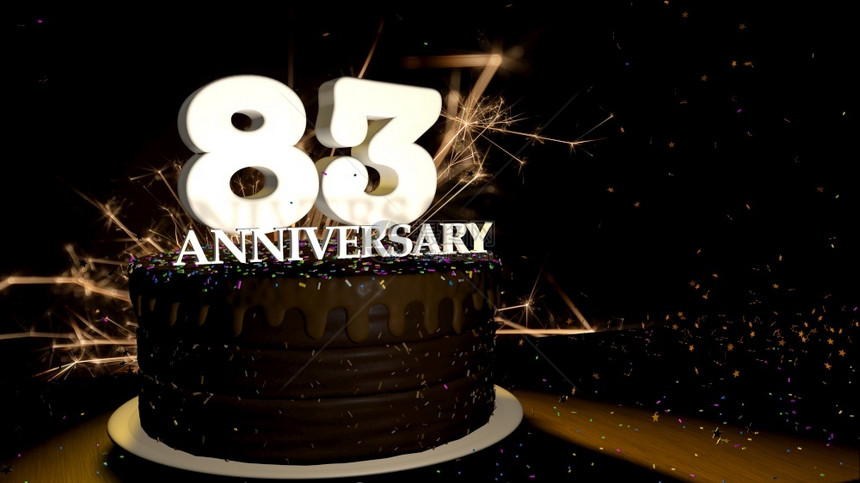 周年纪念83卡圆形巧克力蛋糕装饰着蓝色红黄绿的糖衣杏仁木桌上有白色数字背景是人造火星和彩色糖衣落在桌子上3D插图周年纪念贺卡巧克图片