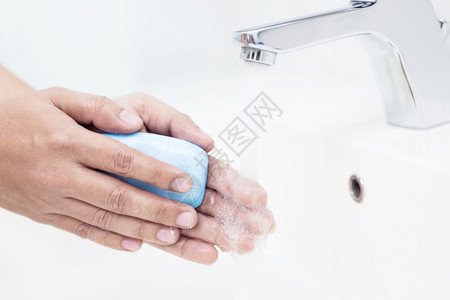 使用肥皂洗手消毒预防特写背景图片