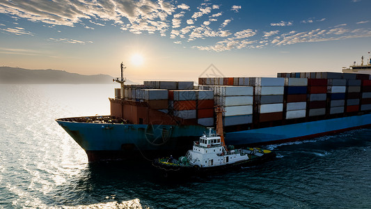 仓库出货素材港口包括亚洲太平洋和欧在内的全世界国际运输大型货物流进口出货的集装箱船在海洋进行商业服务运输以及从无人驾驶飞机对日光背景照片进行背景