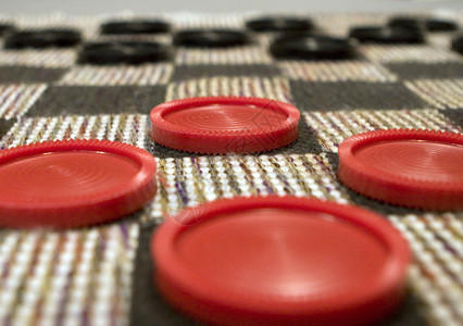 跳棋器黑色木板娱乐游戏红色宏观国王背景图片