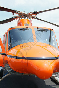 橙色直升机转子菜刀飞行座舱情况救援航空窗户背景图片
