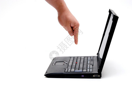 笔记本电脑上的手电子商务工作按钮黑色技术手指电子产品键盘钥匙互联网背景图片