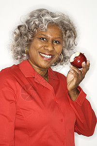女人吃苹果女士照片白发营养中年水果妇女女性食物背景图片