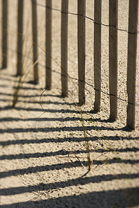 沙滩上篱笆沙滩上的木篱笆背景