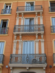 旧大楼前楼建筑学橙子建筑师黄色建筑阳台高清图片