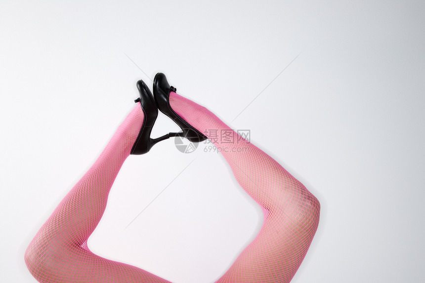 粉红色的腿和高跟鞋丝袜紫红色水平女性网袜粉色图片