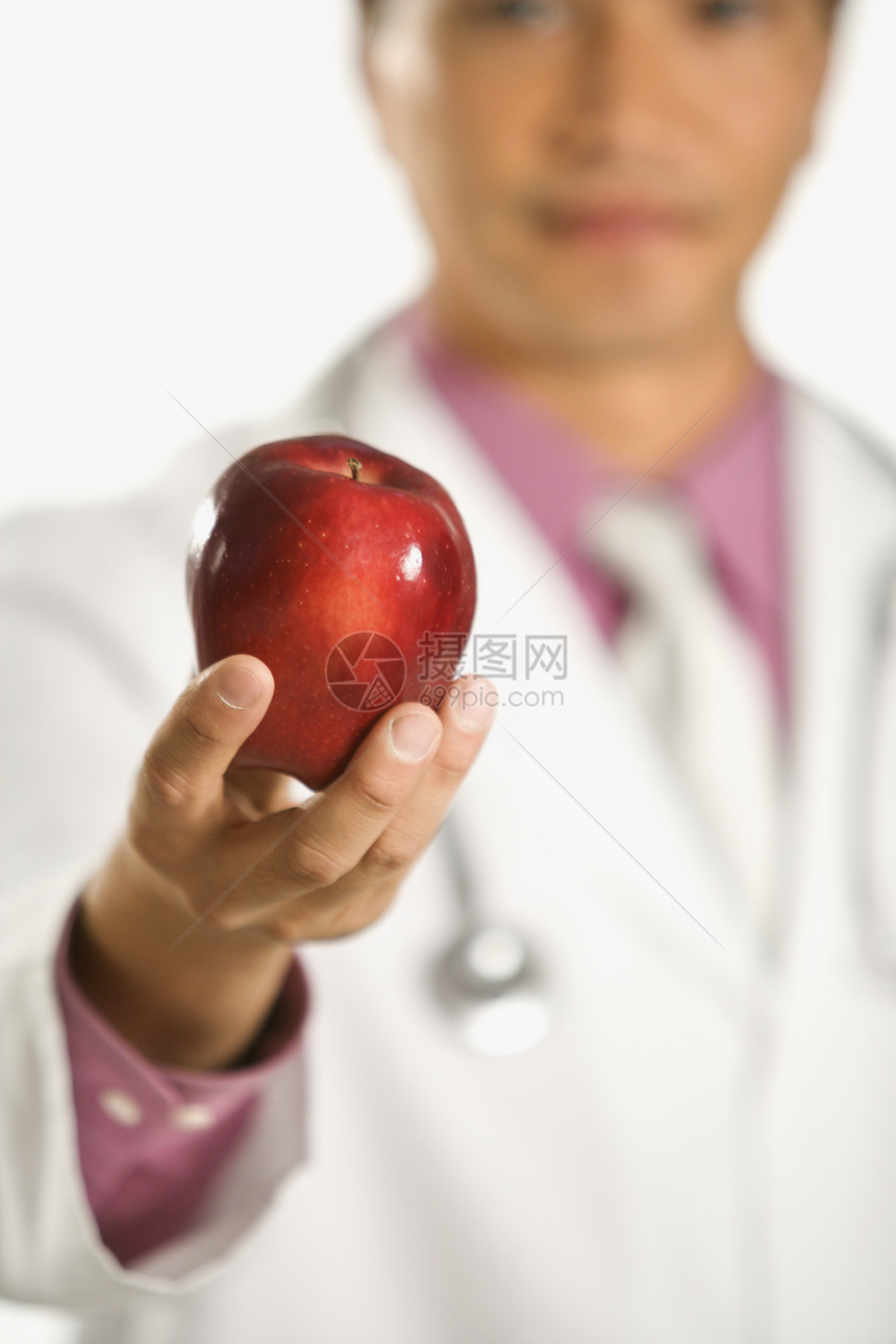 医生拿着苹果选择性处方食物白领水果制药药品工作保健医师图片