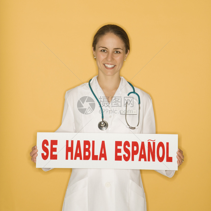 医生和西班牙标志专业人员健康女士中年人女性职业黄色医师语言眼神图片