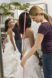 测量新娘的裁缝背景图片