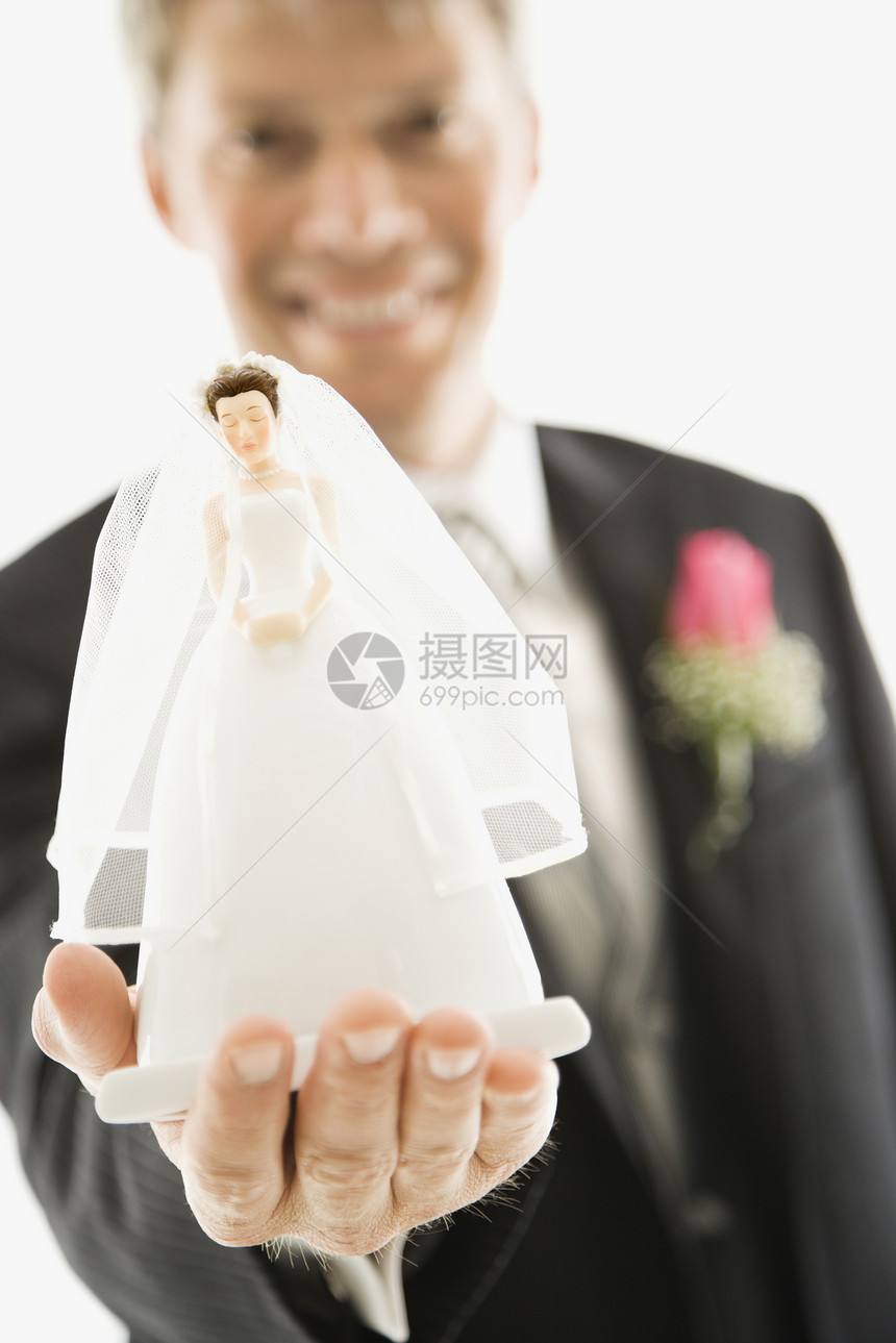 与新娘雕像的Groom男人燕尾服塑像丈夫奉献眼神婚礼婚姻礼物男性图片