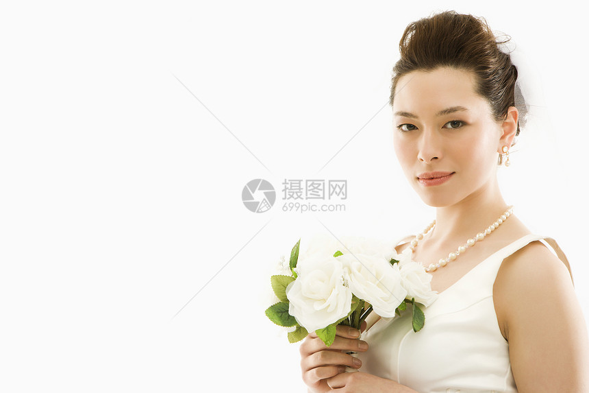 新娘与花束女性女士花朵妻子婚姻水平婚礼眼神图片