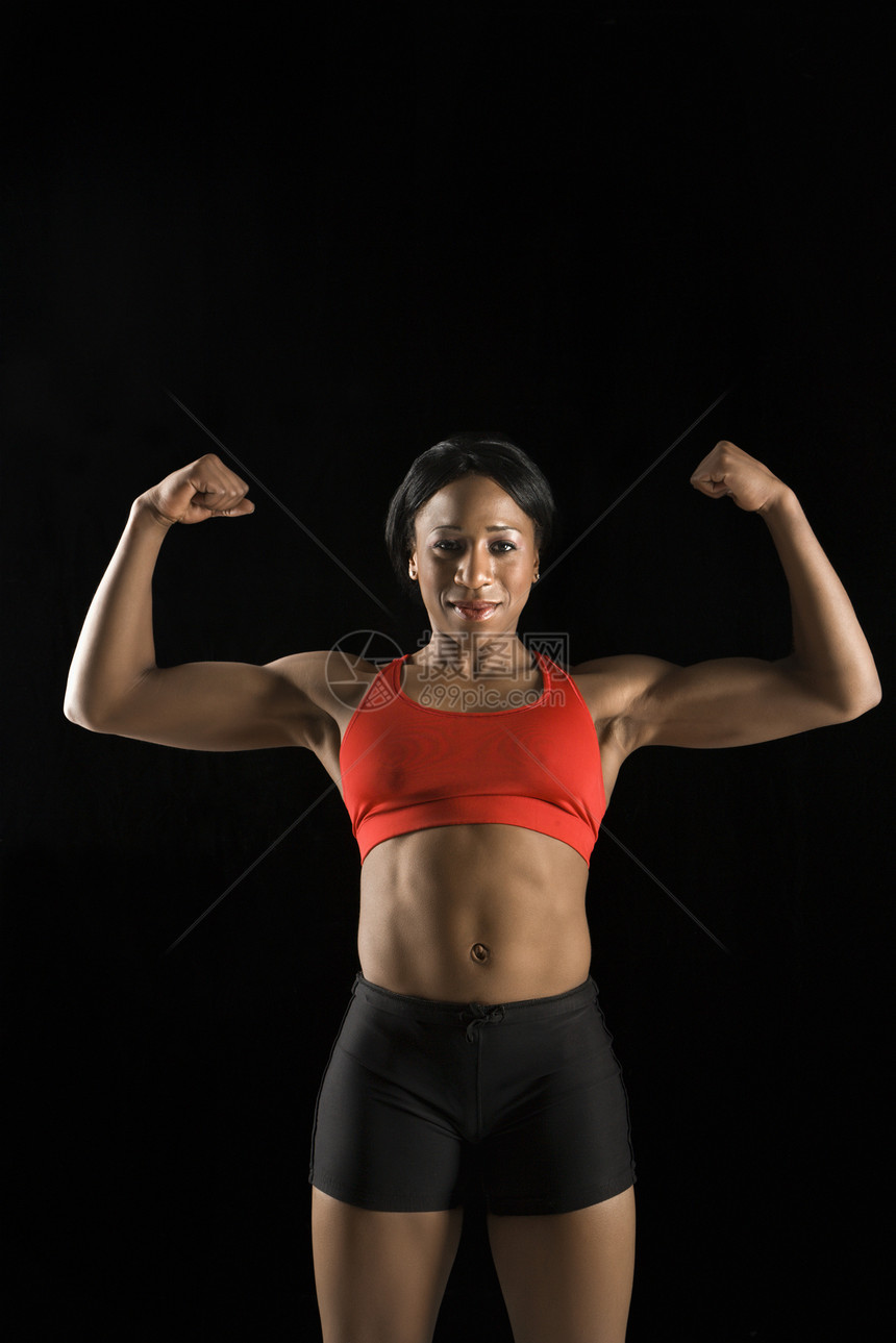 运动肌肉的女性运动员眼神健美照片运动服文胸女士双臂身体素质成人二头肌图片