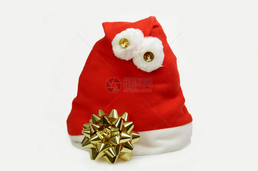 红色圣诞老人礼帽绒球垃圾丝带传统金子白色钟声雪橇季节图片