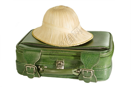 行李袋假期旅行手提箱髓盔帽子怀旧老相机娱乐背景图片