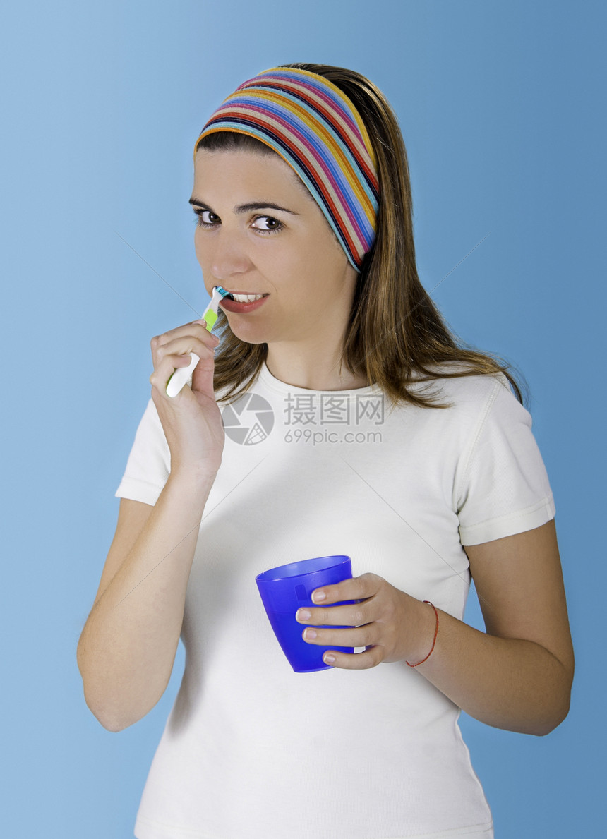 刷牙牙膏女性蓝色卫生微笑深色药品牙医打扫保健图片