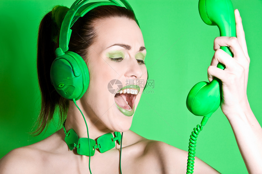绿色愤怒女性化化妆品乐趣女士幽默耳机电话女性图片