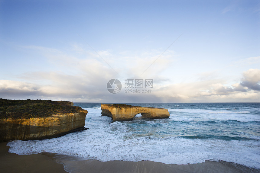 沿海岩石形成石灰石拱门海滩旅行照片海岸海景支撑地貌波浪图片