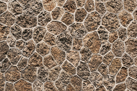 石头背景建筑学棕色石墙建造建筑岩石石方壁画水泥砂浆背景图片