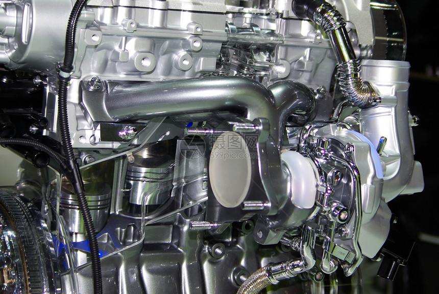 汽车发动机的特写 车轮的引擎力量商业工作柴油机速度运输运动合金圆圈金属图片