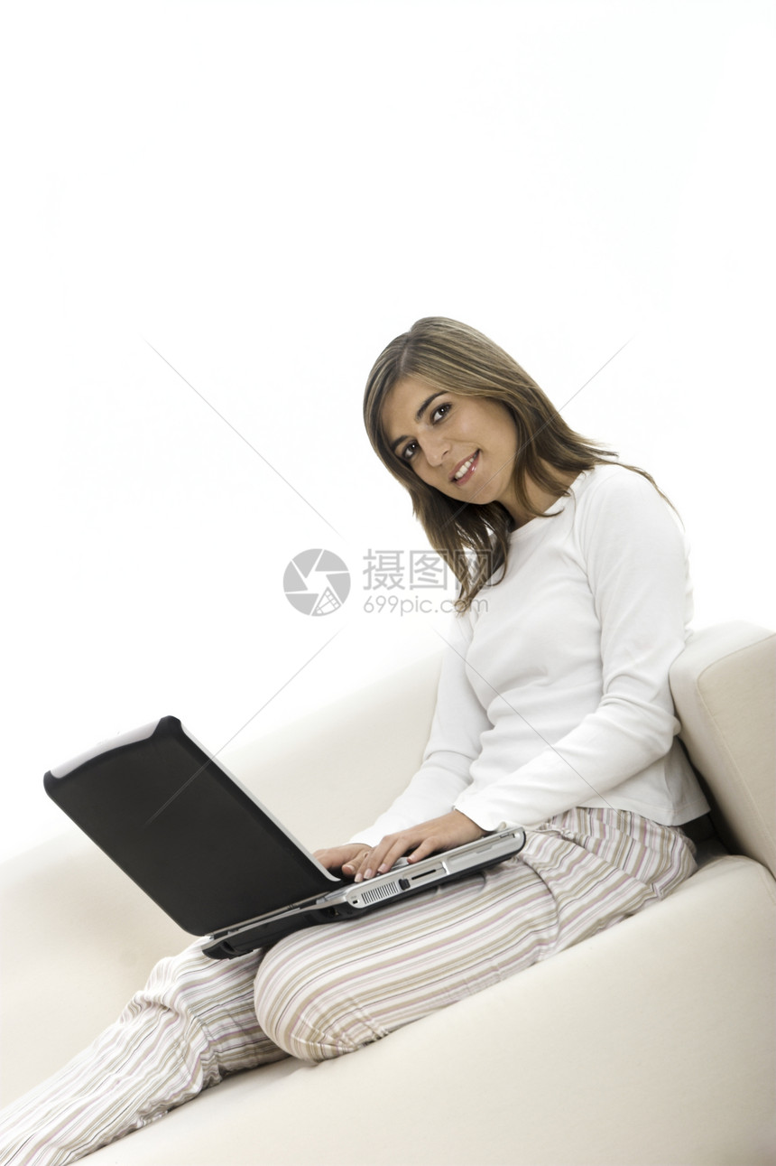 使用笔记本电脑的家庭工作商业睡衣职场商务人士职业女性乐趣娱乐家庭作业图片