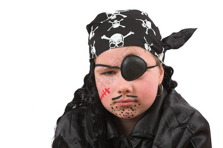 万圣节眼罩十岁的女孩 打扮成海盗背景