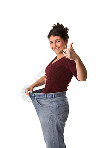 体重减减女性化幸福牛仔裤黑发减肥女性饮食背景图片