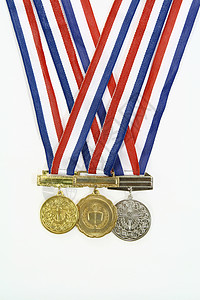 勋章红色荣誉金属圆形金子冠军蓝色优胜者青铜白色背景图片