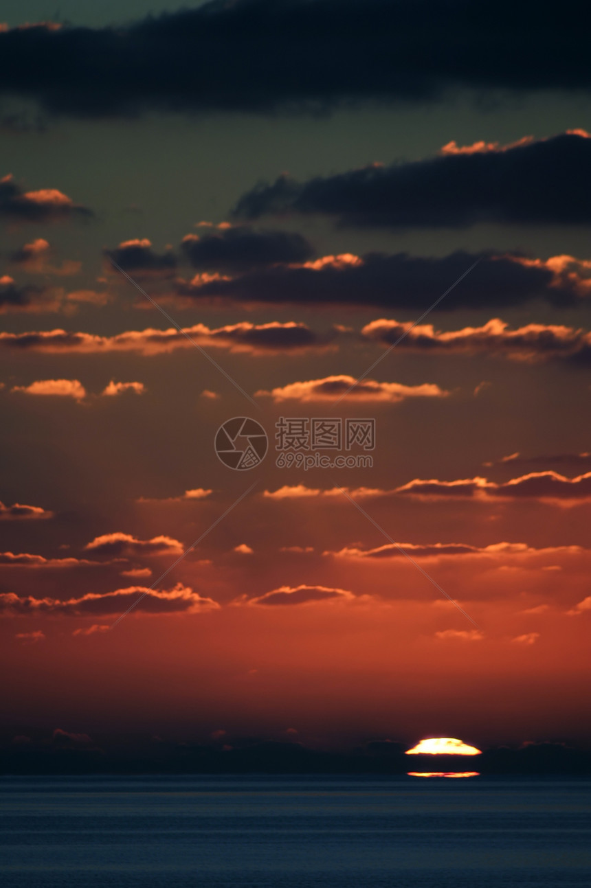 太阳日落地平线旅行旅游阳光热带橙子海岸假期风景反射图片