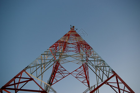 移动电话塔天线金属渠道电话信号卫星蓝色工作背景图片